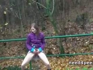 Blonde Lifts Up Her Leg And Takes A Warm Piss