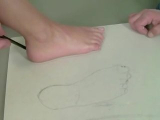 Outstanding diva giving footjob and riding pecker